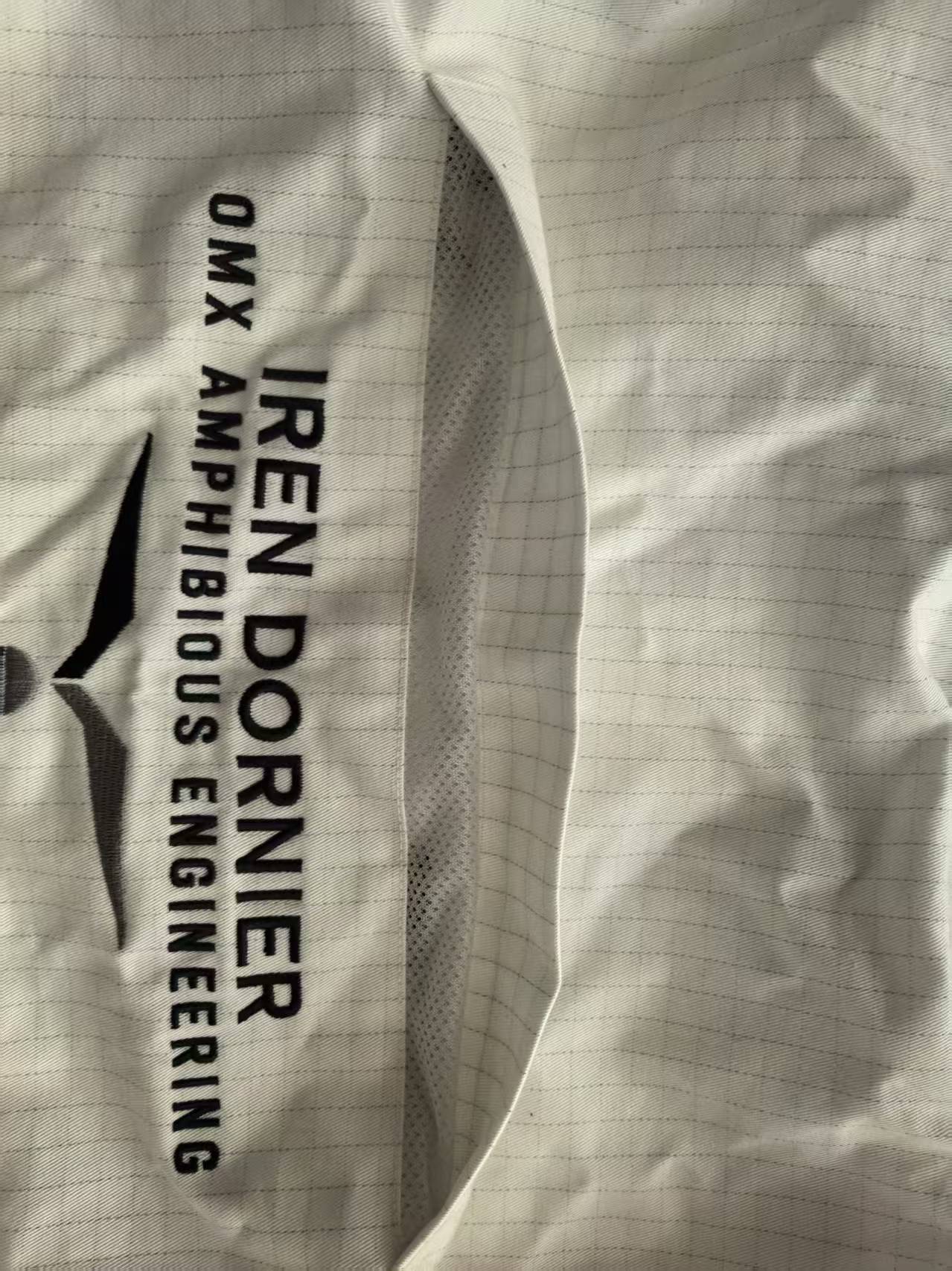 Actual back ventilation detail showing mesh beneath an overlapping fabric panel