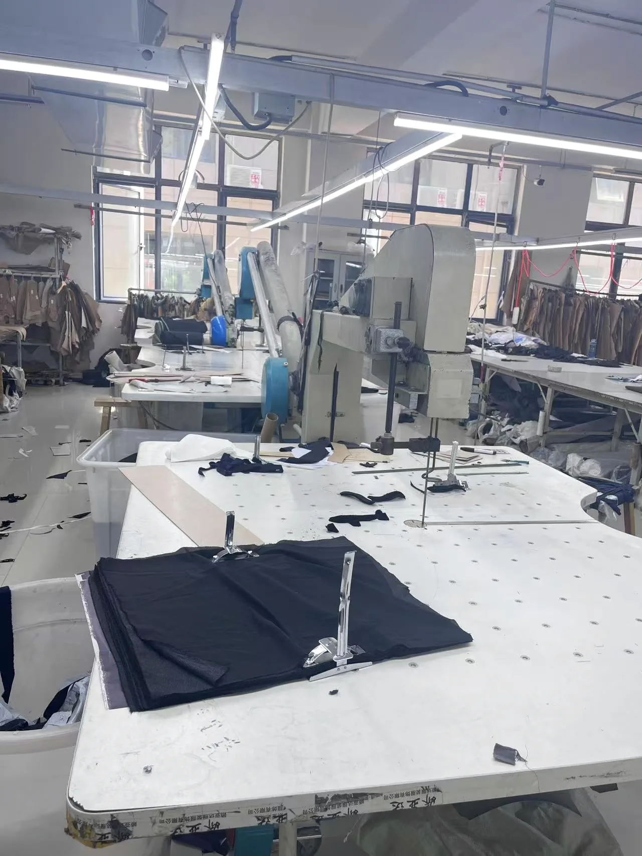 Garment patterns and panels on a cutting table